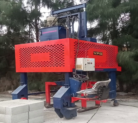 Block loading grabber machine